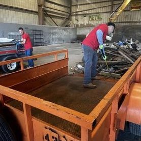 Crew loading the trailer