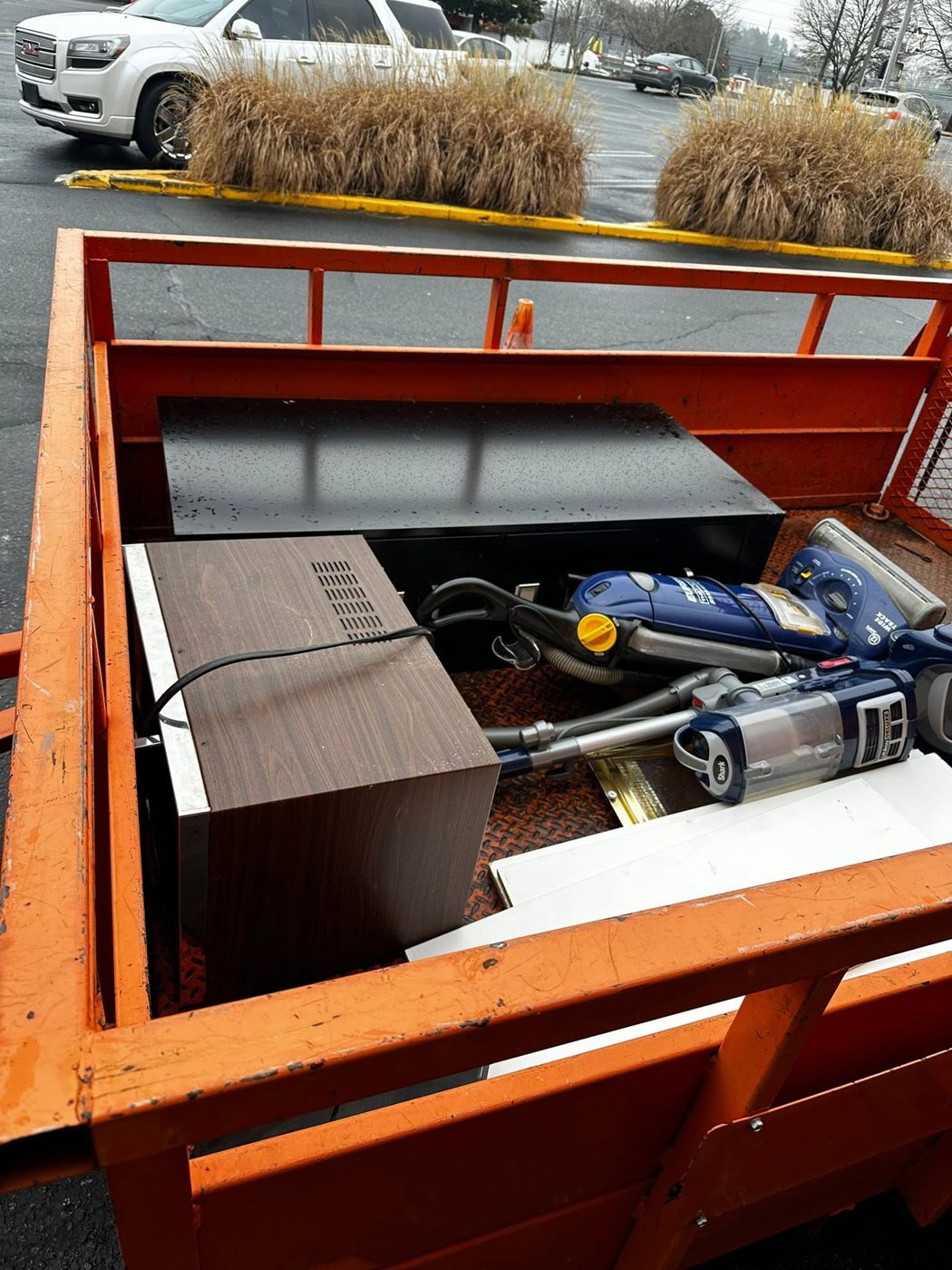 Trailer packed with old electronics and appliances