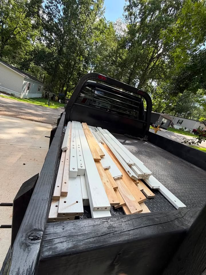 Construction lumber and trim loaded for debris removal in North Georgia