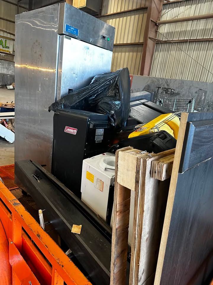 Appliances and household junk dropped for recycling and disposal